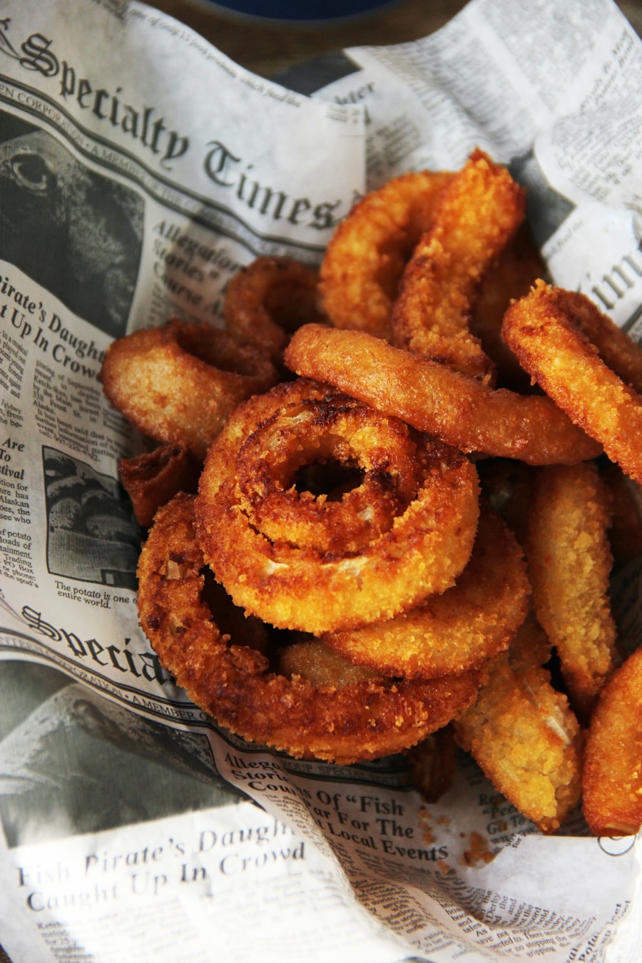 Fried sides on newspaper